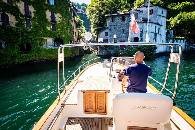 2H Private Cruise on a beautiful wooden speedboat on Lake Como - Stop 2: Villa Olmo — passing the seaplane hangar and admiring from the water