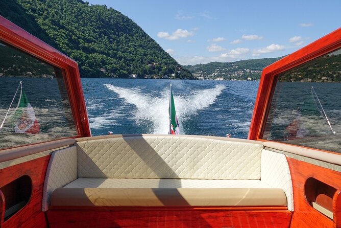 4 Hours Private Wooden Boat Tour stop Bellagio Varenna 6 pax - Entering Lake Como from Como’s public pier (and getting settled fast)