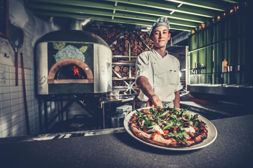 Como: Premium Pizza-Making Class at a Pizzeria - Margherita prep in a wood-fired oven setting
