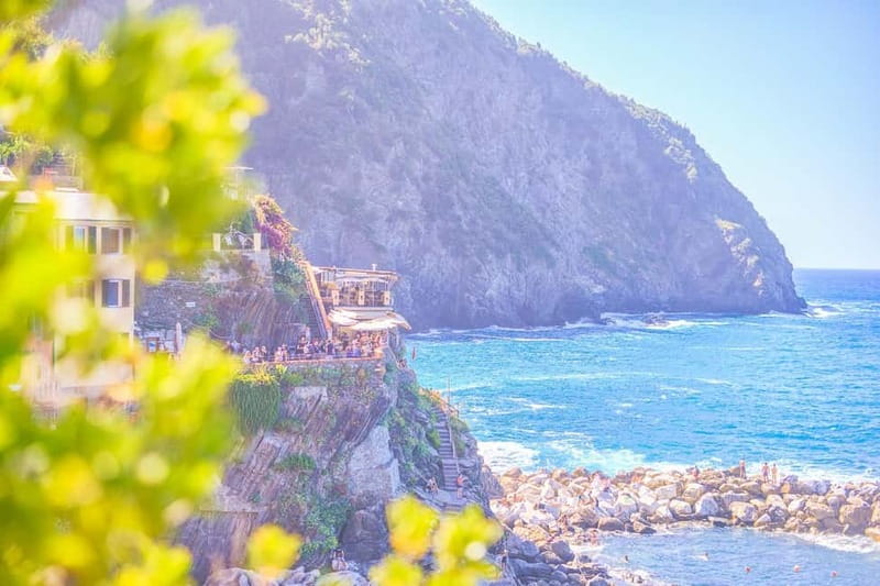 From Milan:Cinque Terre National Park with Limoncino Tasting - Riomaggiore: Cliffside Color and Narrow-Street Life