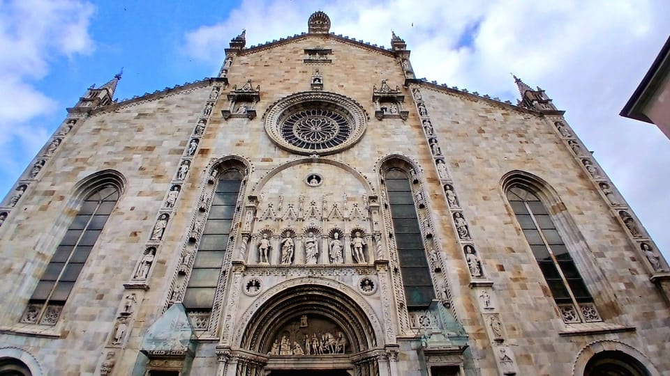 How: Tour of the historic center - Piazza San Fedele: Roman roots, Romanesque charm, and the dragon portal