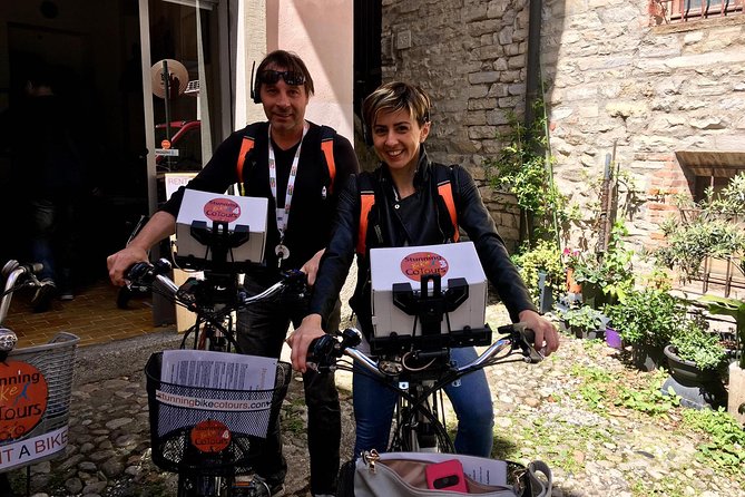 Lake Como: eBike City Tour Guided by an iPad and a Tour Leader - Life Electric and Volta Square: lake symbols and scientific pride