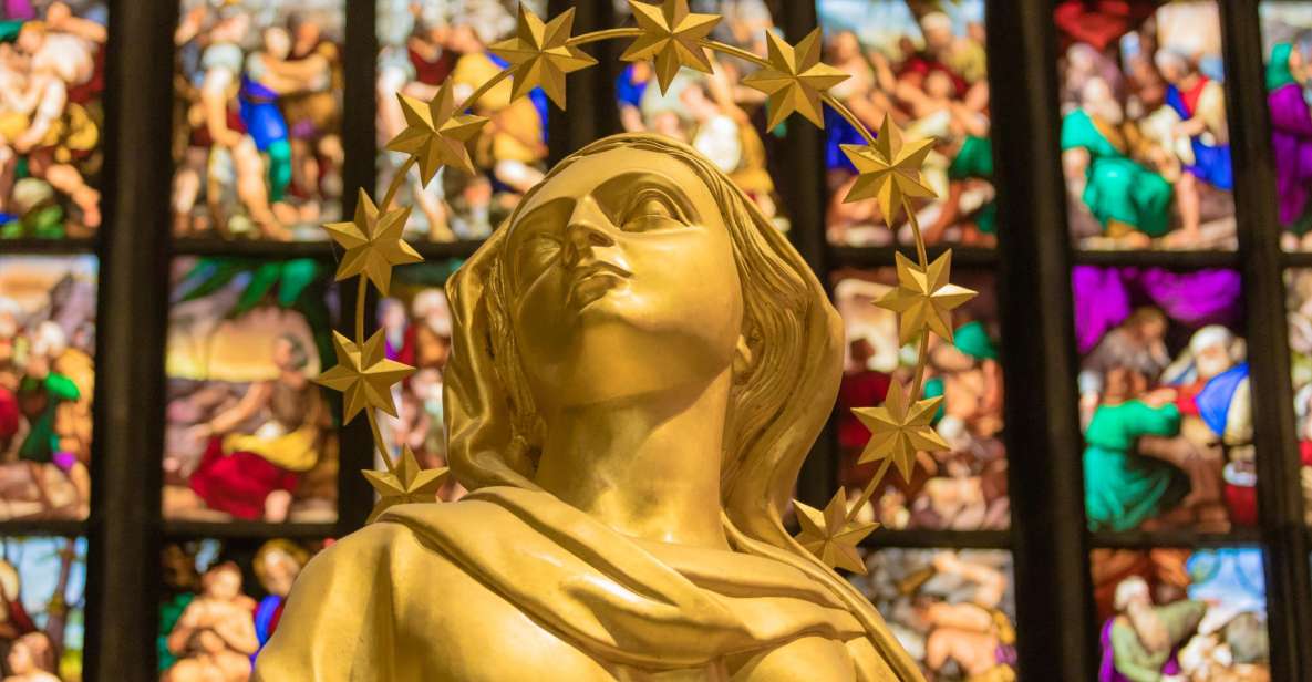 Milan Duomo Cathedral Tour - Outside first: the façade’s statues, spires, and gargoyle oddities