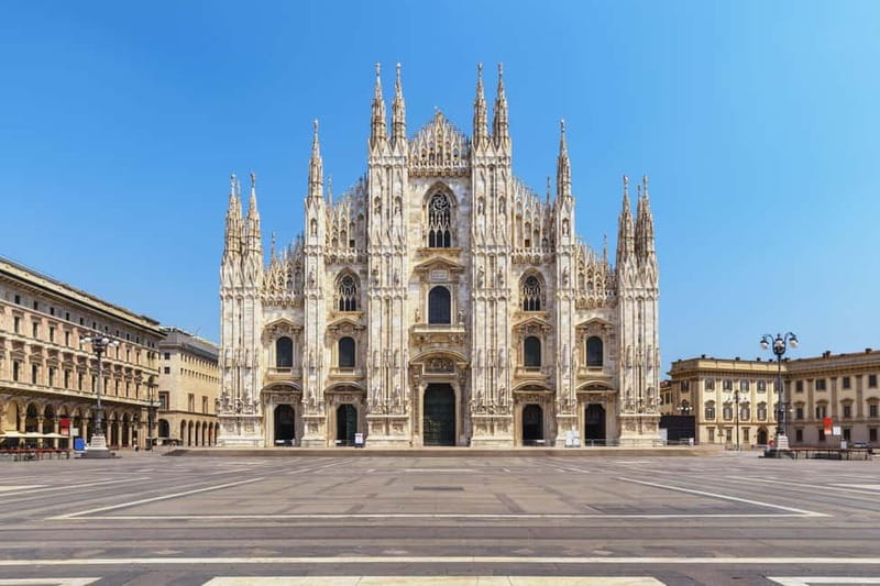 Milan: Fast Track Cathedral and Duomo Rooftop Guided Tour - Interior Highlights: Columns, Stained Glass, and the Altar
