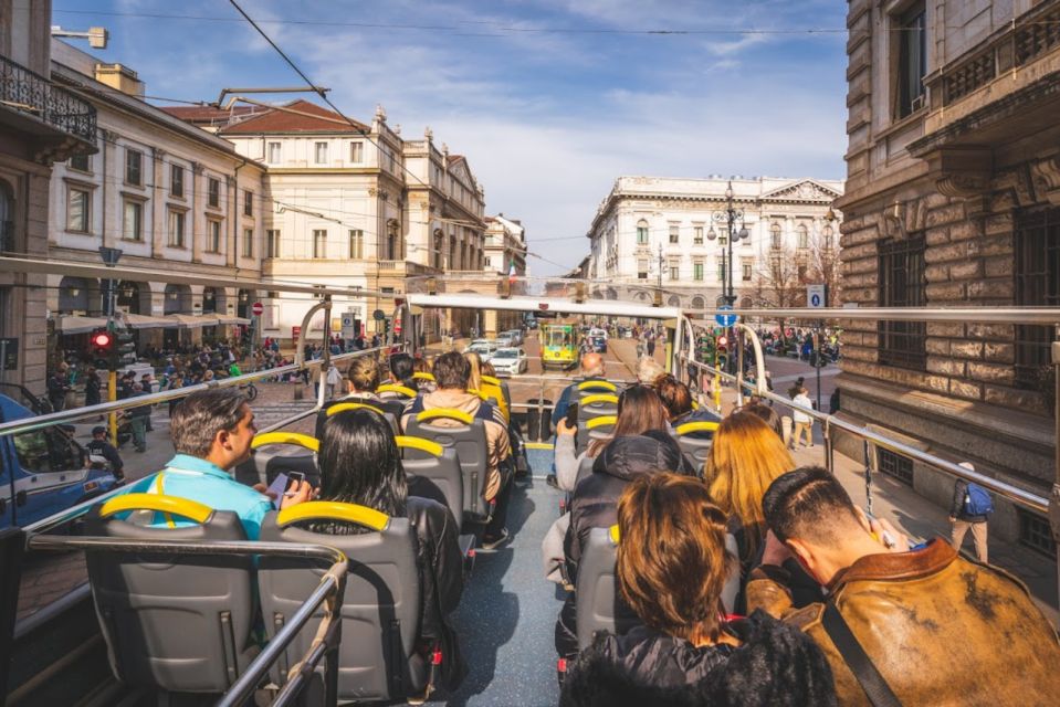 Milan: Gray Line Milan Open Tour Hop-On Hop-Off Bus Tour - On-board comforts: WiFi, USB power, and rainy-day reality