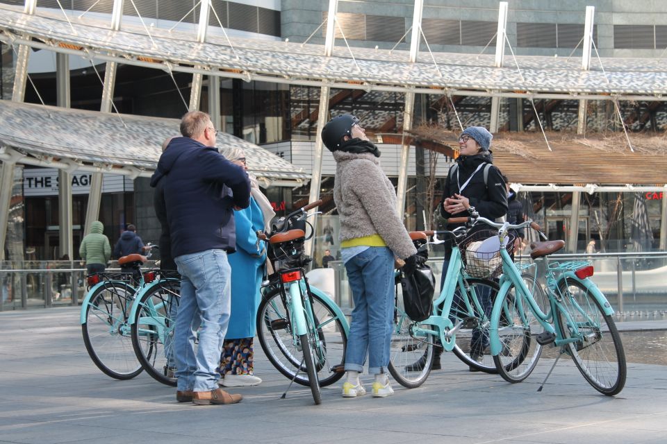 Milan: Highlights and Hidden Gems Guided Bike Tour - Porta Nuova: Seeing Modern Milan After the Old Core