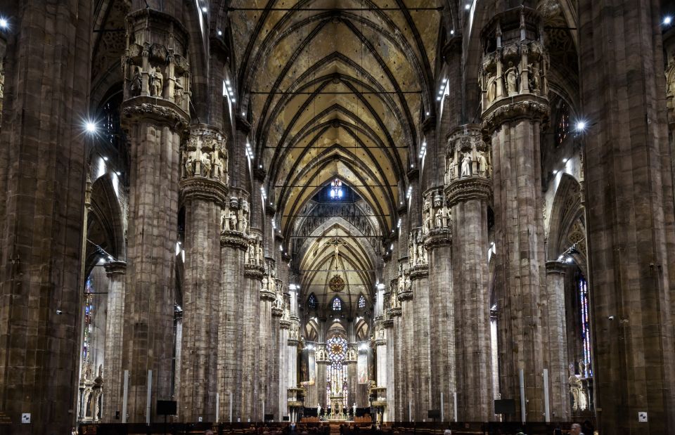 Milan: Highlights Guided Tour and Duomo Priority Access Tour - Galleria Vittorio Emanuele II: The Shopping Arcade That Acts Like a Monument