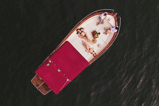 Private Boat Tour on Italian Gozzo on Lake Como - Getting on the water: choosing Varenna, Menaggio, Tremezzina, or Como
