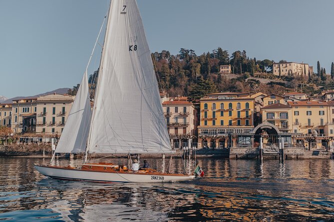 Private Guided Sailing Boat Tour on Lake Como with Aperitif - The aperitif on board: wine, photos, and a slower kind of timing