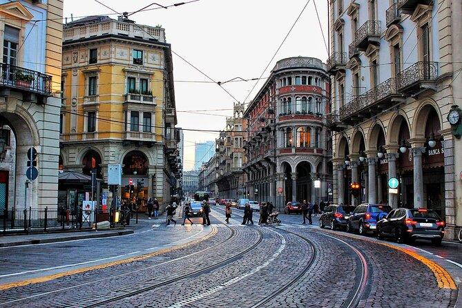 Turin Full-Day guided tour. Departure from Milan - Piazza Castello: Royal Views, Teatro Regio, and the Via Roma Connection